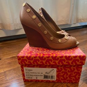 Wedge peep toe sandal by Tory Burch.